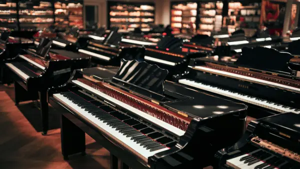 Collection of beginner pianos with 88 keys, compact designs, and built-in speakers, ideal for new pianists to practice and learn