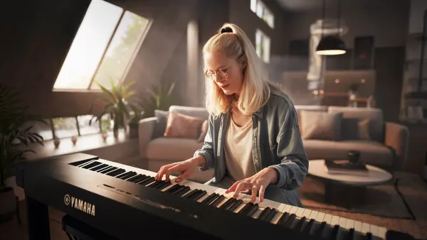 Collection of Yamaha pianos including digital, acoustic, and hybrid models, featuring advanced sound technology and sleek designs for musicians of all levels