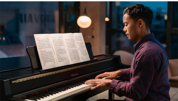 Roland FP-E50 digital piano with 88 weighted keys, advanced sound engine, and Bluetooth connectivity, perfect for performers and music producers.