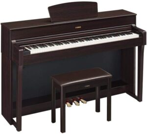 Yamaha YDP-184 digital piano with 88 weighted keys, CFX Grand Piano sound, and a stylish wooden cabinet, ideal for home use and practice