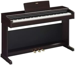 Yamaha YDP-145 digital piano with 88 weighted keys, classic wooden cabinet design, and CFX Grand Piano sound, ideal for home use