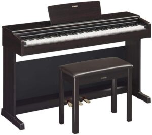 Yamaha YDP-144 Arius digital piano with 88 weighted keys, elegant wooden cabinet, and realistic CFX Grand Piano sound, ideal for home use