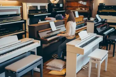 Collection of piano keyboards featuring weighted keys, built-in speakers, and modern sound technology, ideal for beginners and professional musicians